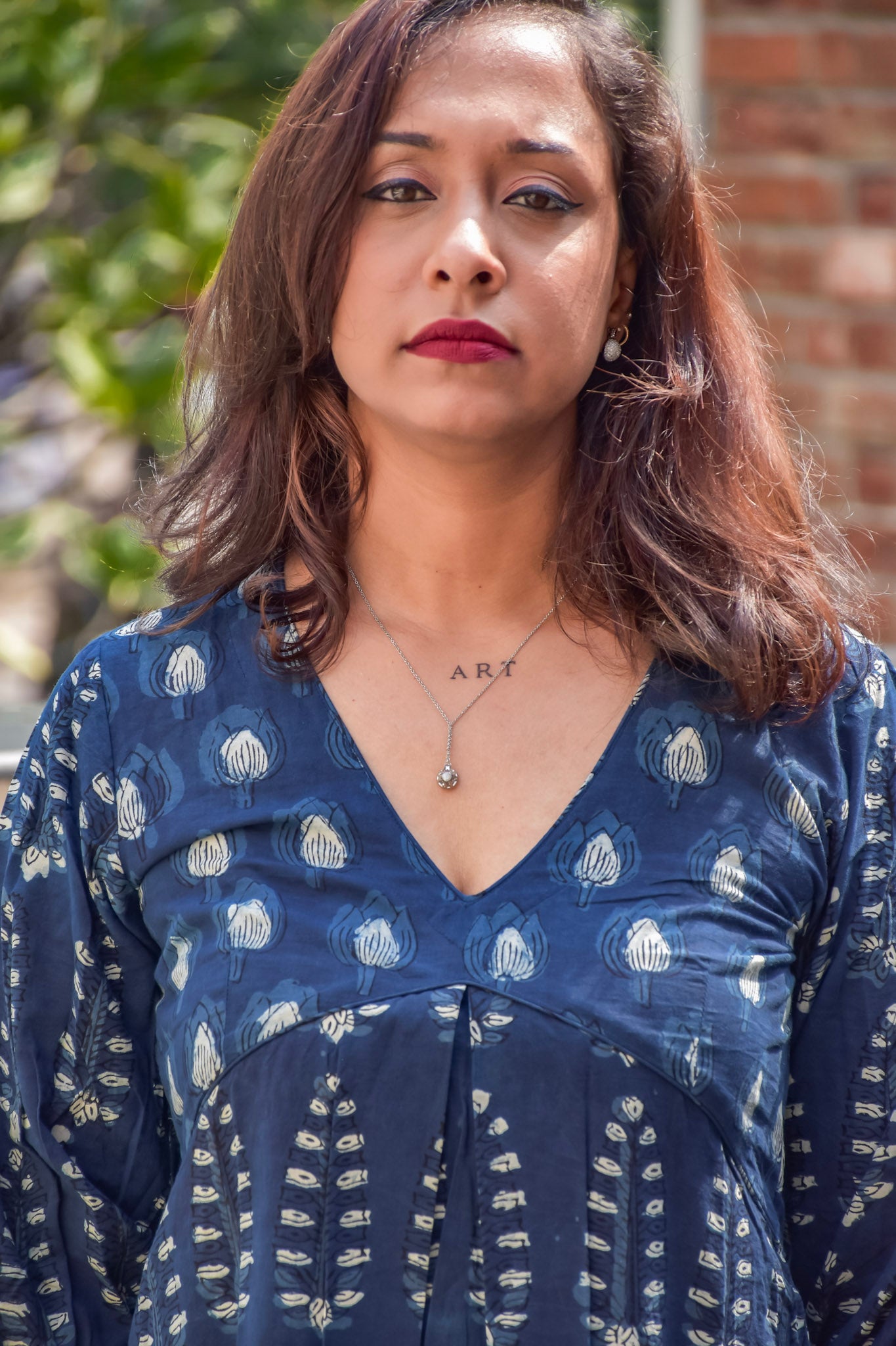 Blue cotton dress with V neck